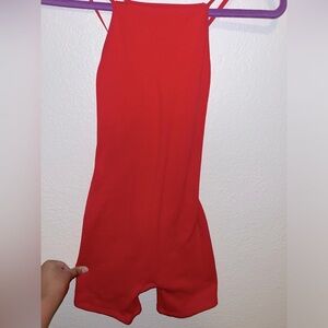 New, has a little rip on the arm strap